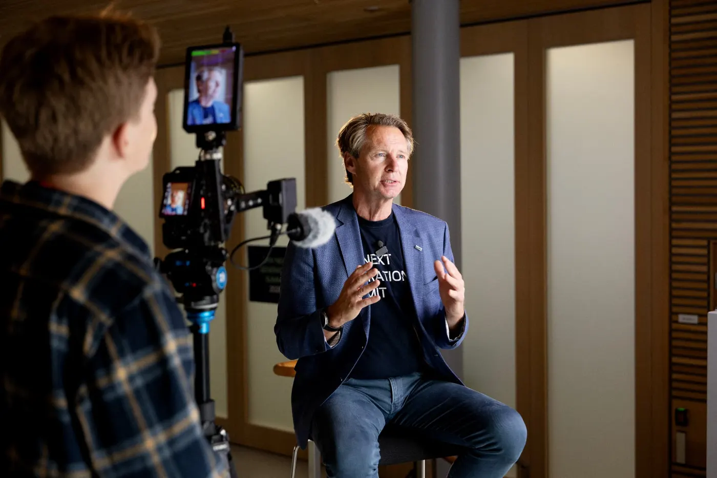 Interview setup with camera and subject in an Oslo office